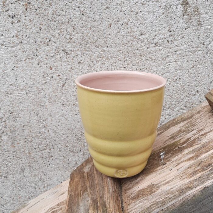 Mia-kop i gul med lyserød